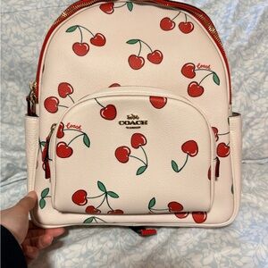 Coach Cherry Print Mini Backpack in Cream and Red
